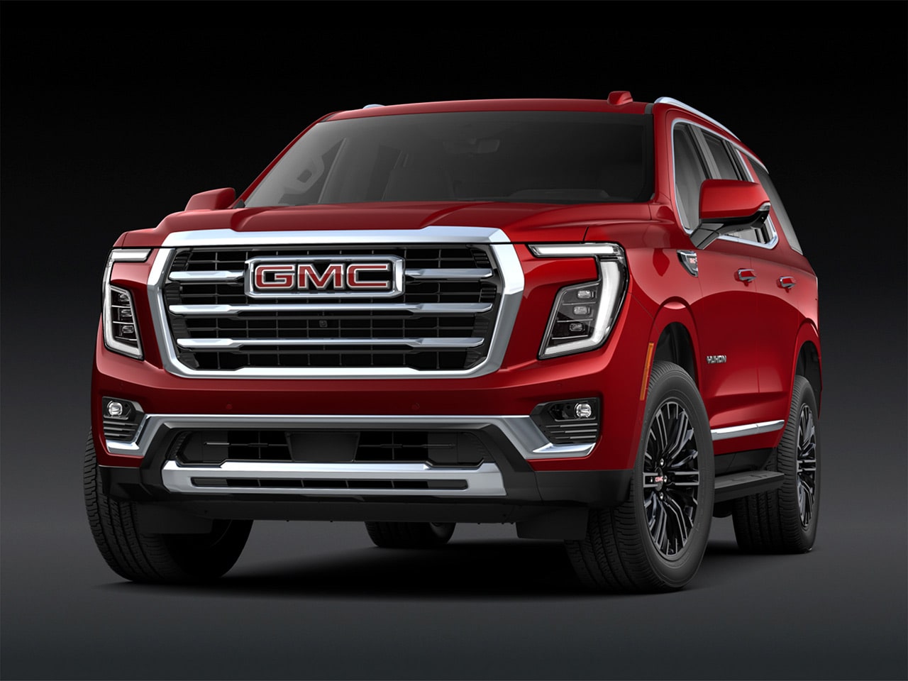 Front View of a Red 2027 GMC Yukon Elevation