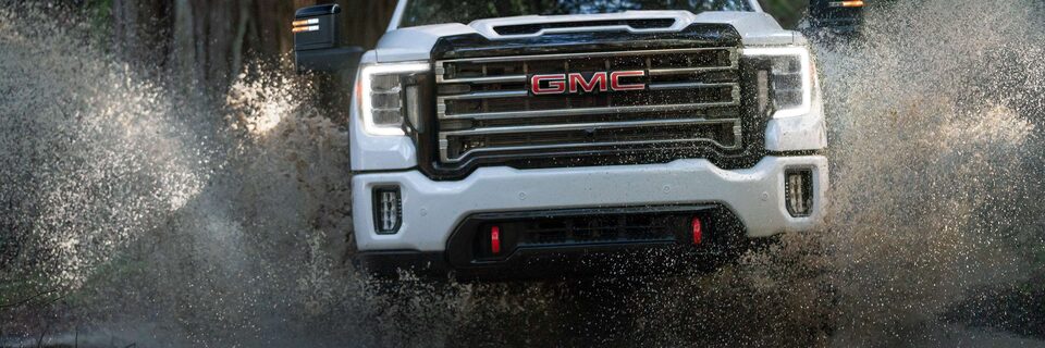 2023 Sierra HD AT4 Front Grille View Parked 