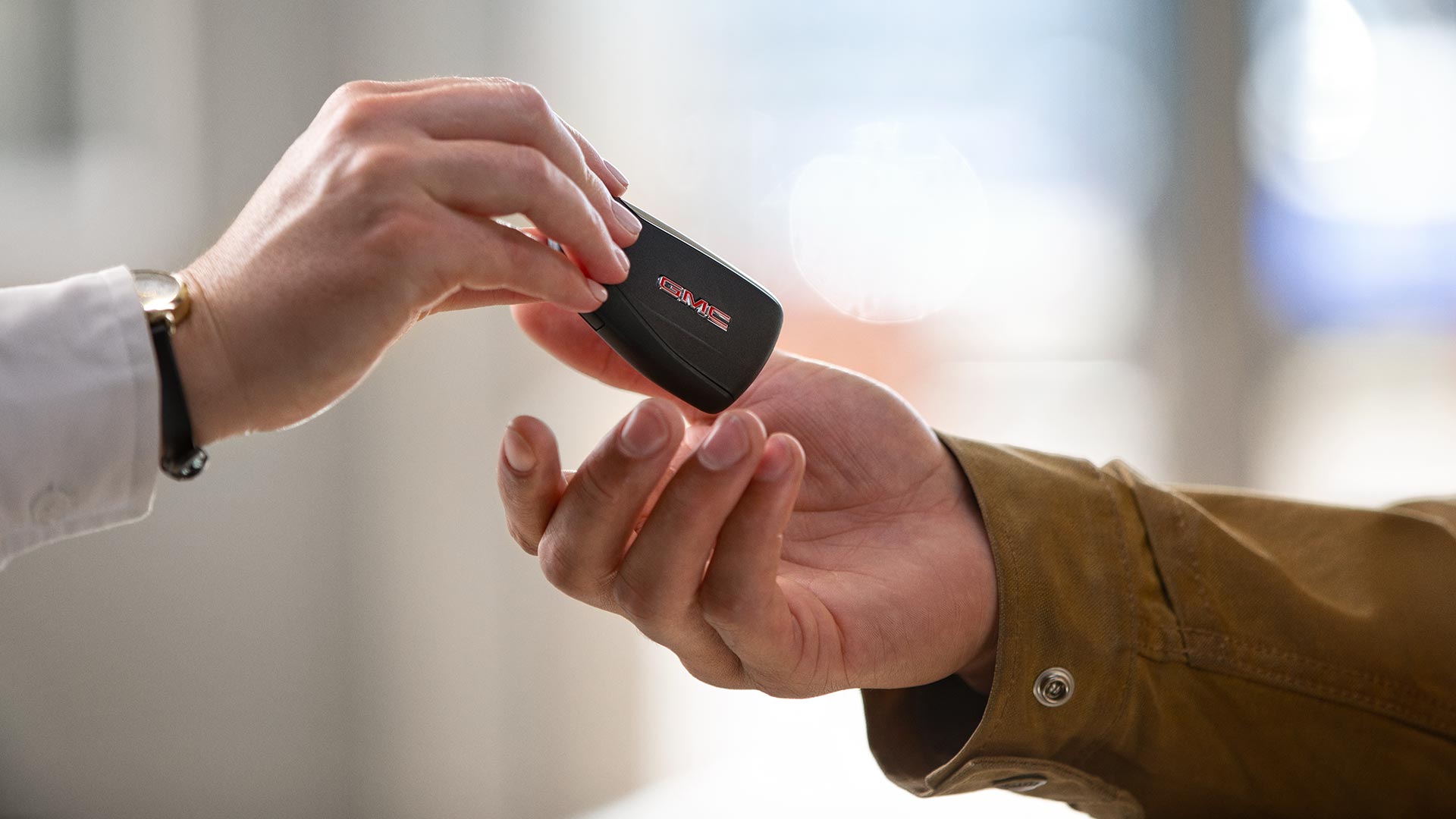 Two Managers Standing Near a Loading Dock Discussing Business