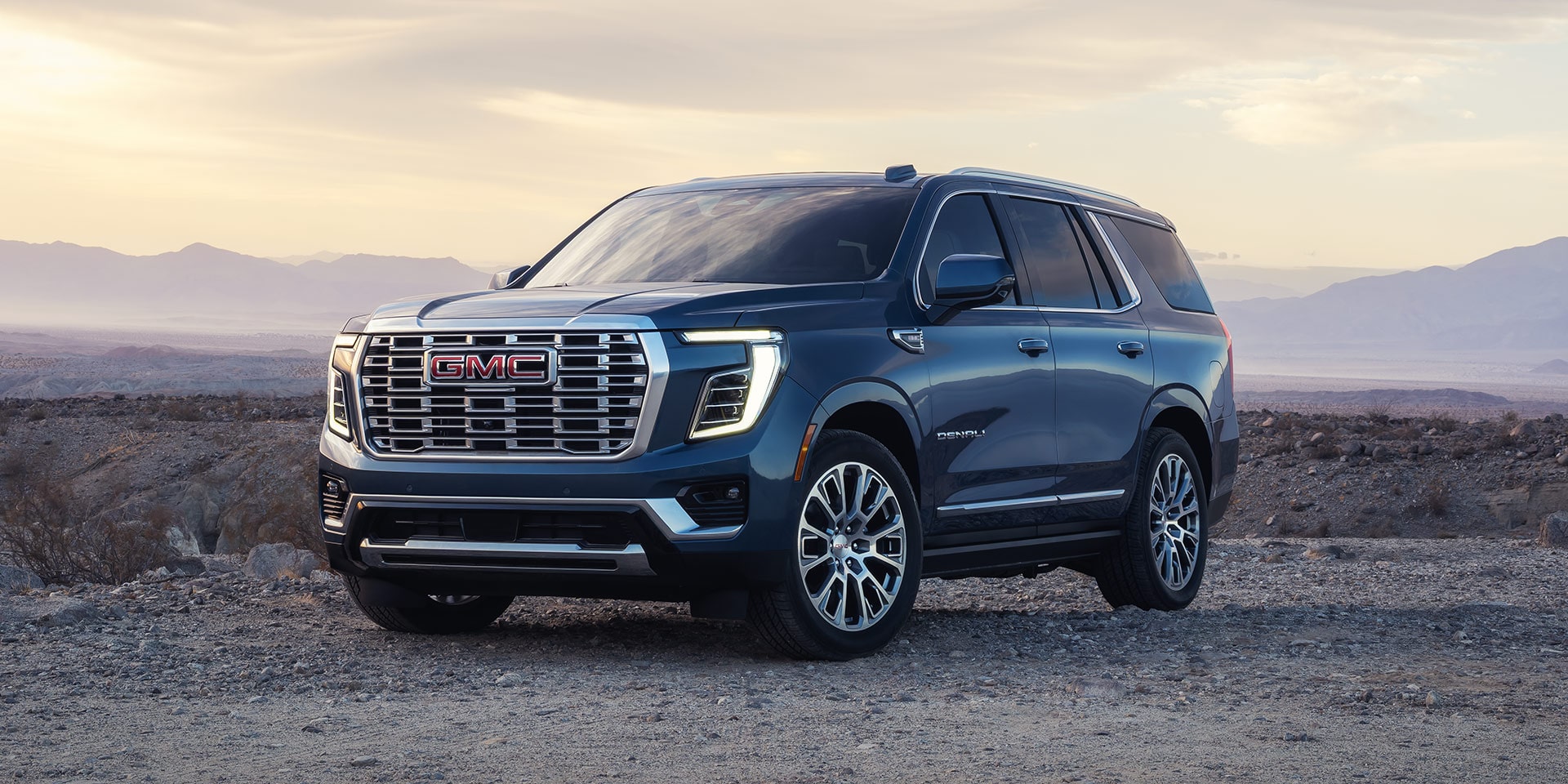 Front Three-Quarters View of the GMC Yukon Denali Luxury 3 Row SUV