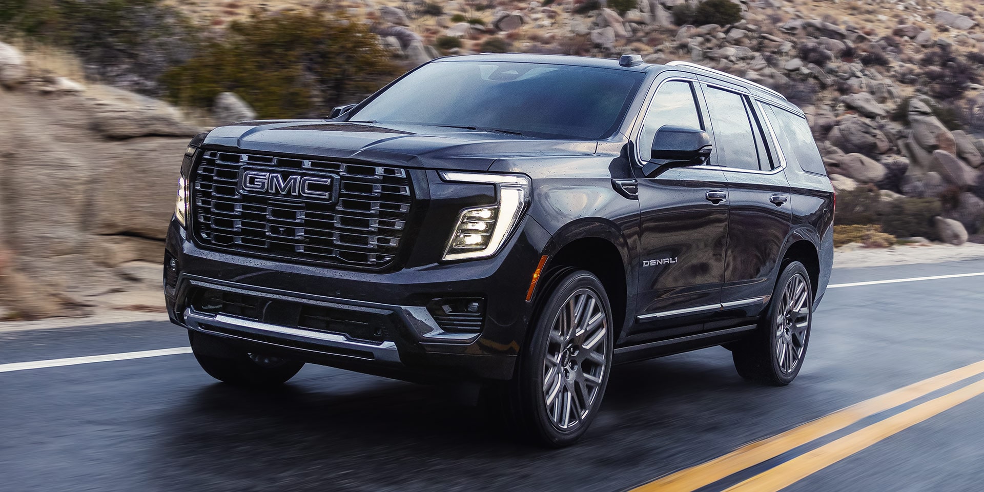 Front Three-Quarters View of the GMC Yukon Denali Ultimate Luxury 3 Row SUV