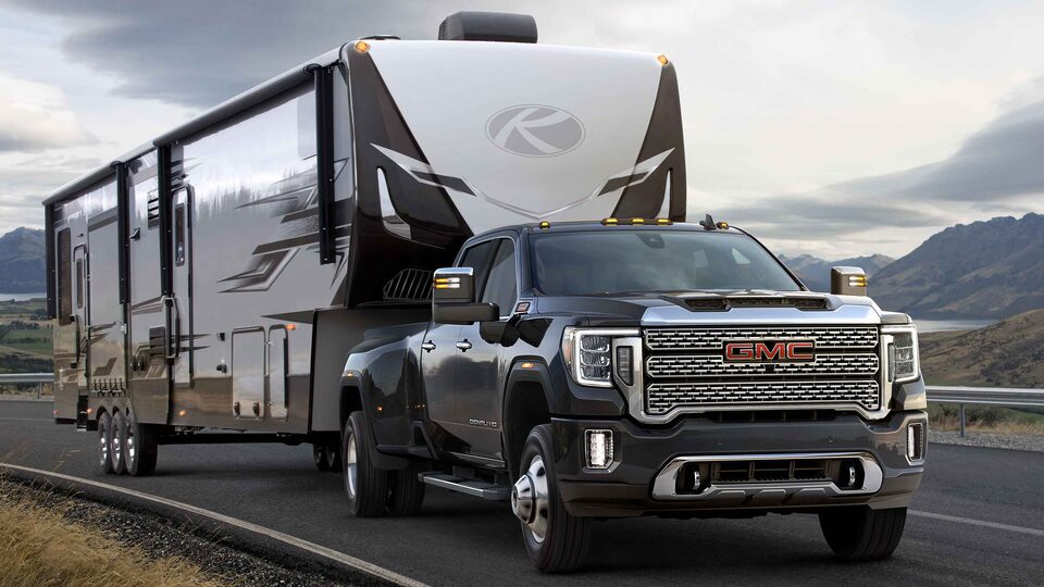 2021 GMC Sierra HD Diesel pulling Camper on Mountainside