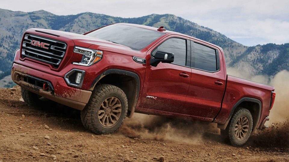 2021 GMC Sierra AT4 Diesel driving on dirt mountain side