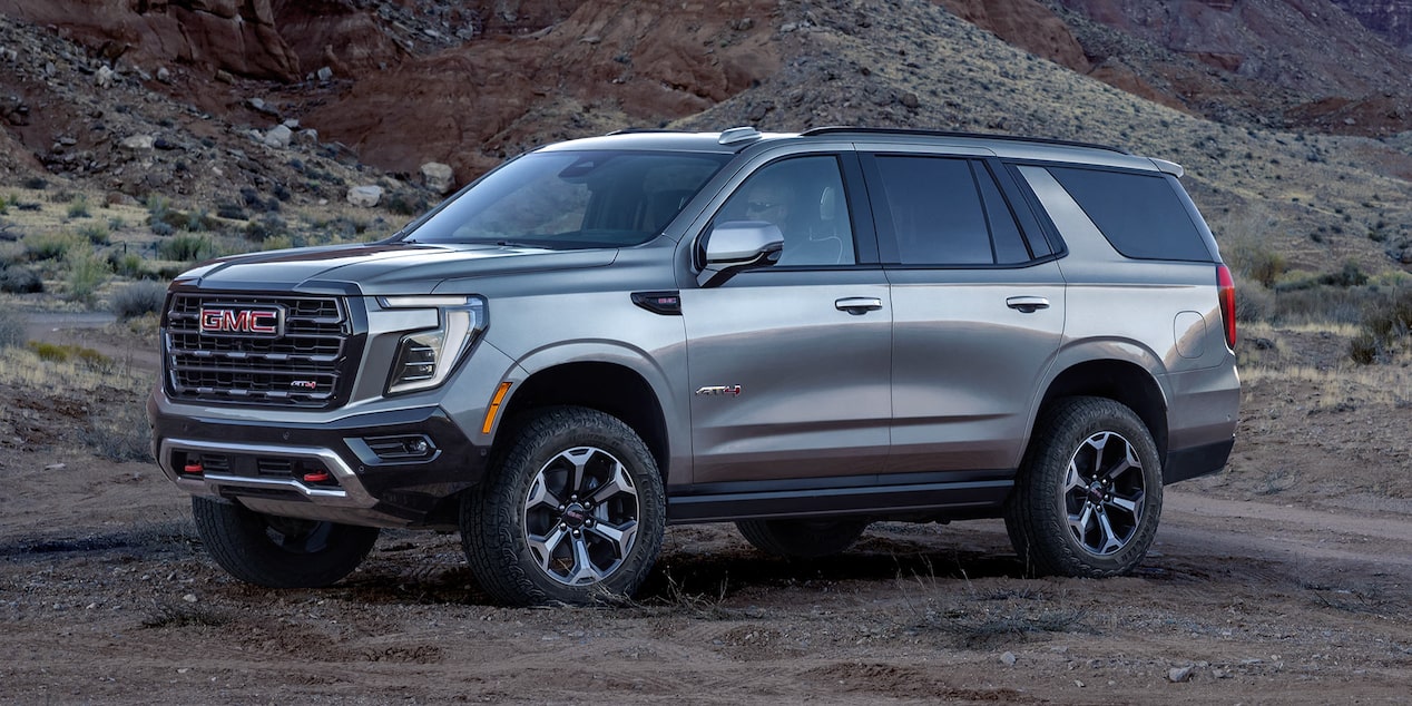 Front Three-Quarters View of the GMC Yukon Parked on a Dirt Road