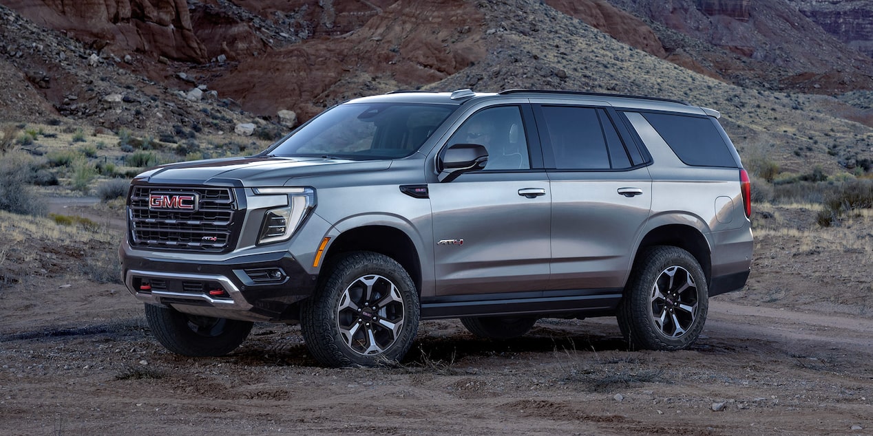 Front Three-Quarters View of the GMC Yukon Parked on a Dirt Road