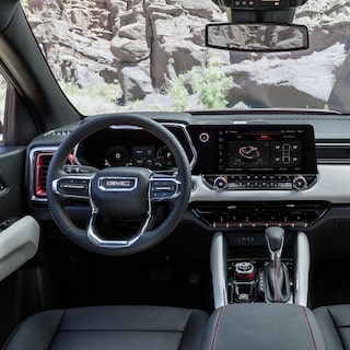 Interior View of the Steering Wheel and Infotainment Screen in the GMC Canyon Pickup Truck