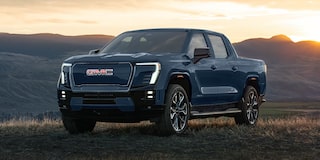 Front Three-Quarter View of the Sierra EV Pickup Truck Parked on the Beach