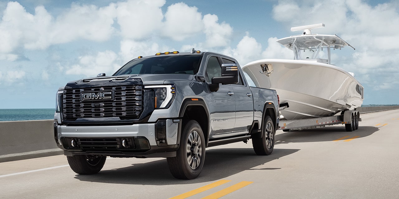 The GMC Sierra HD Pickup Truck Towing a Trailer