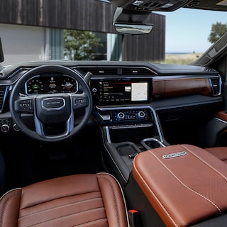 Interior View of the Steering Wheel and Infotainment Screen in the GMC Sierra HD Pickup Truck