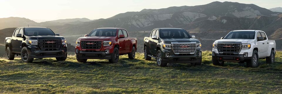 2021 GMC Truck Lineup in front of mountains