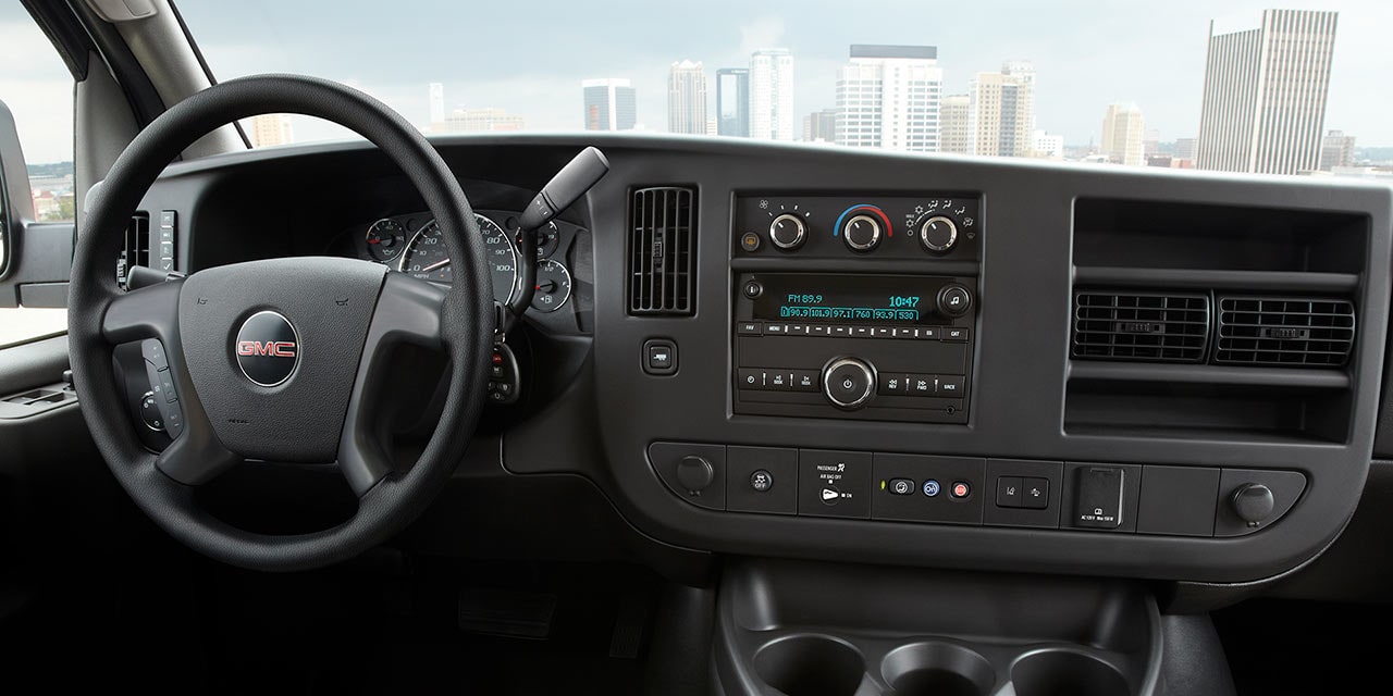 Interior View of the Steering Wheel and Dashboard in the Savana Cutaway Van