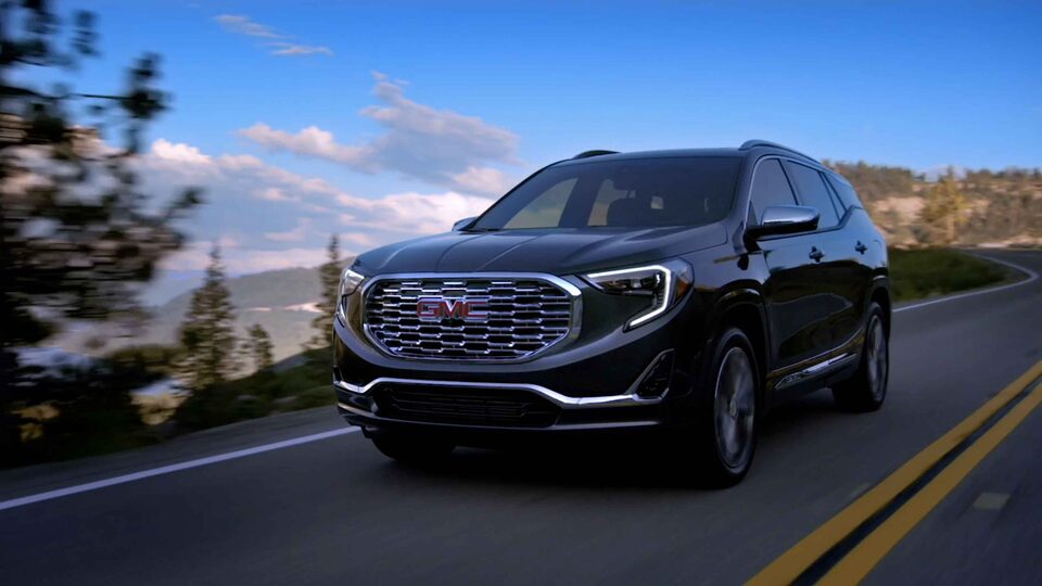 2021 GMC Terrain Small Compact SUV in Ebony Twilight Metallic Video Exterior Front View Driving