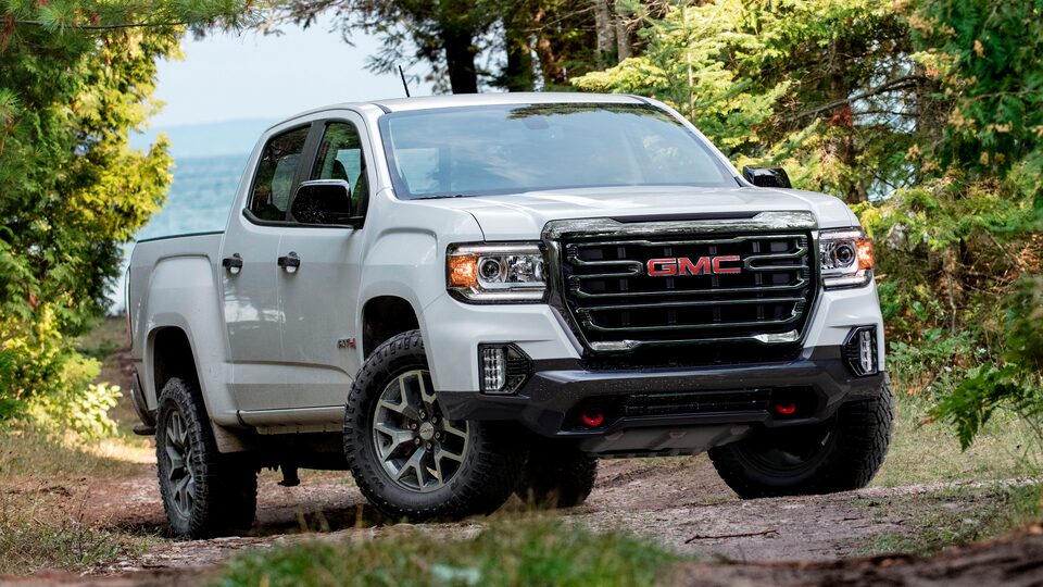 2022 GMC Canyon Denali Small Luxury Truck Exterior Three-Quarters View Driving