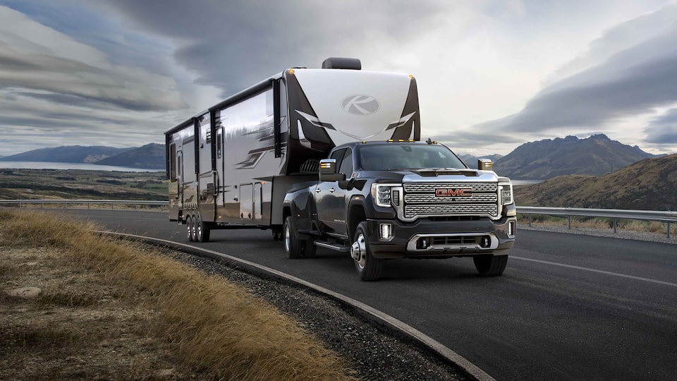 2021 GMC Sierra HD Heavy Duty Truck towing a camper