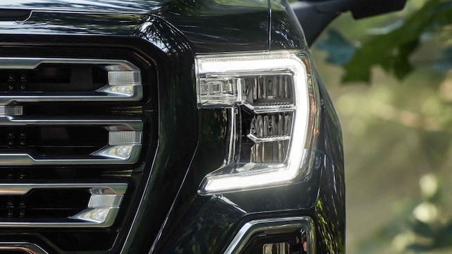 2021 GMC Sierra 1500 AT4 Off-Road Truck with headlamps on close up
