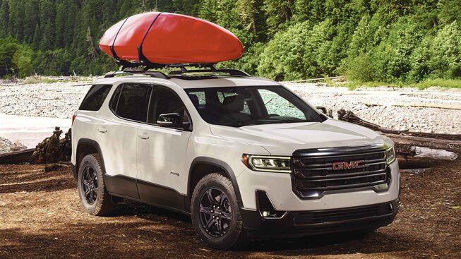 2022 GMC Acadia AT4 Off-road SUV Front Side View with Kayak on Roof