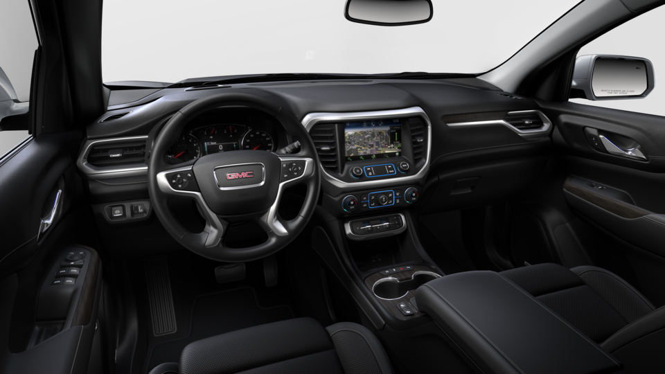 The Jet Black Interior on the GMC Acadia With the Steering Wheel and Infotainment System