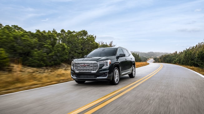 2022 GMC Terrain Denali Small SUV Driving on Road - Front Side View