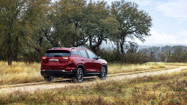 2022 GMC Terrain SLE/SLT Small SUV Driving on Dirt Road - Rear View