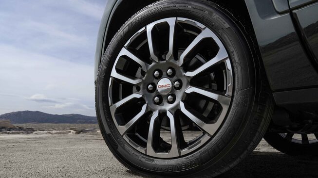 2023 GMC Acadia Denali Mid-Size Luxury SUV Exterior Front Wheel Close up