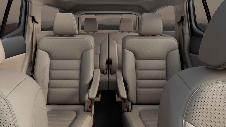 2023 GMC Acadia mid-size SUV with blind spot lights on side mirrors