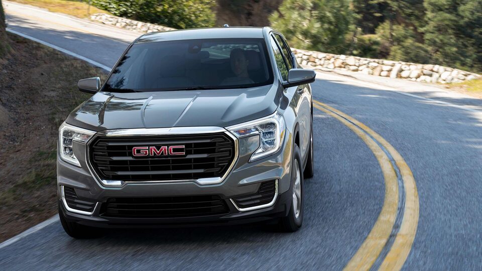 Quicksilver Metallic GMC Terrain SLE Driving On-Road