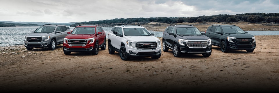 A Lineup of the Trims on the GMC Terrain Parked