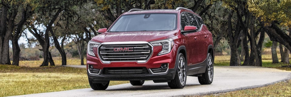 The Red GMC Terrain on a Trail in a Park