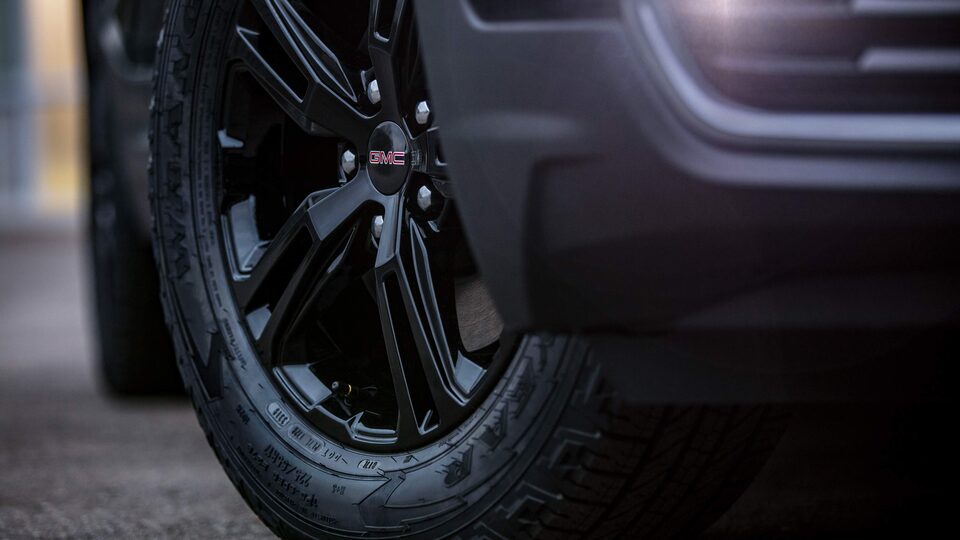Closeup on Jet Black Rim and Tires on the GMC Terrain AT4
