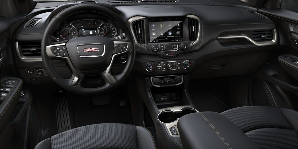 The Jet Black Interior with the Steering Wheel and Infotainment System on the GMC Terrain AT4