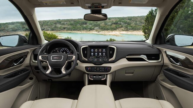 The Beautifully Designed Interior of the 2023 Terrain Denali Accompanied with a Breath Taking View