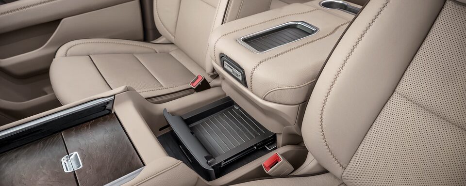 Teak Interior on the Yukon Denali with Charging Station, Cup Holders, and Center Console