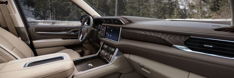 The Yukon Full-Size SUV Modern Interior With a View of the Forest