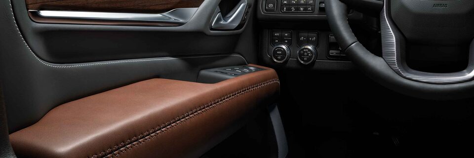 Yukon Denali Driver Side Controls with Brown Leather Interior