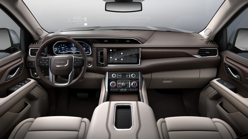A Rear Passengers View of the Front Light Shade Interior of the GMC Yukon Denali