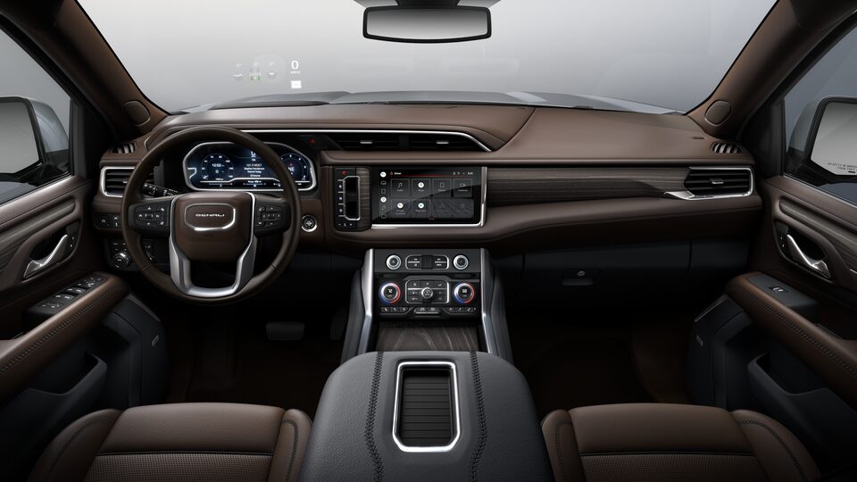 A Rear Passengers View of the Front Dark Walnut Interior of the GMC Yukon Denali