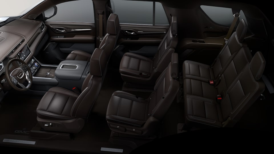 A View of the Interior Three Row Dark Walnut Seating on the GMC Yukon Denali