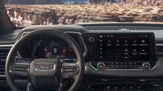 Closeup on the Infotainment System and Steering Wheel of the GMC Canyon Elevation