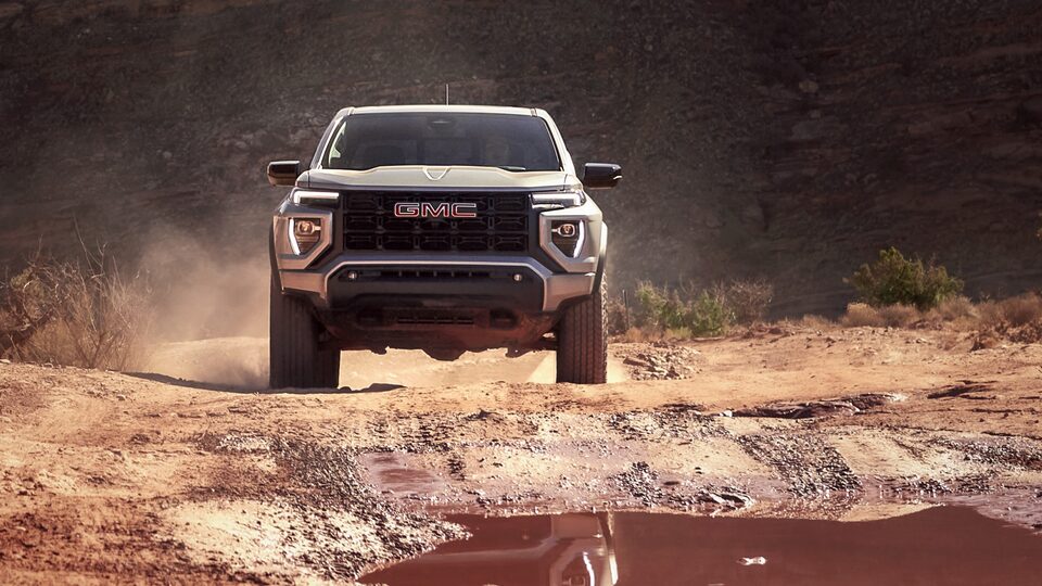 The Canyon Elevation Speeding in the Desert Kicking up Sand