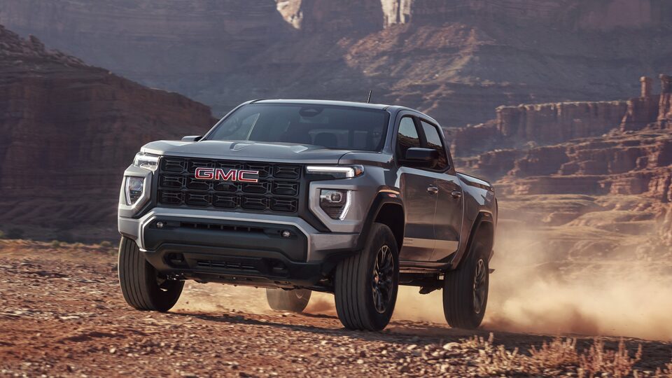 The Powerful GMC Canyon Elevation Driving Uphill in a Desert
