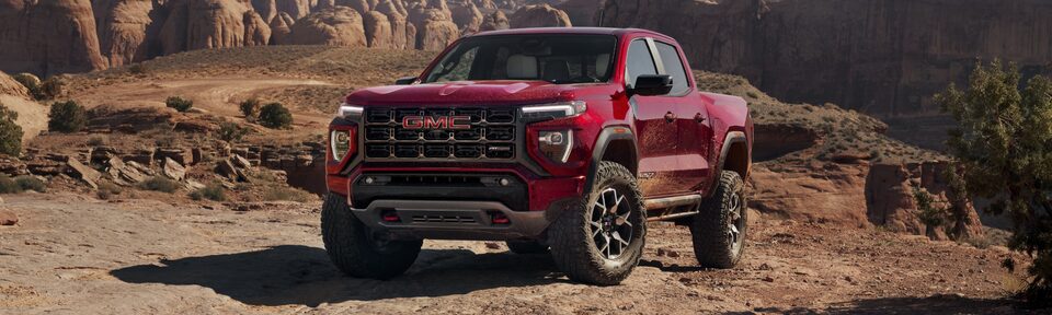 The Powerful new GMC Canyon AT4X Driving off Road on Dirt near Canyons