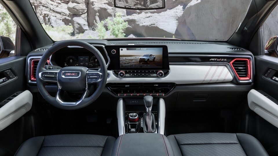  The Stylish Front Interior of the GMC Canyon AT4X Equipped with Leather and a Infotainment System
