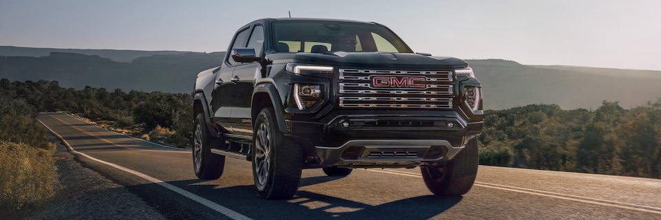 The GMC Canyon Denali Driving On-Road in the Desert