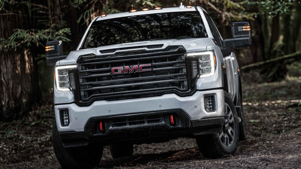 GMC Sierra HD AT4 Off-Road Truck Driving Through Mud & Water