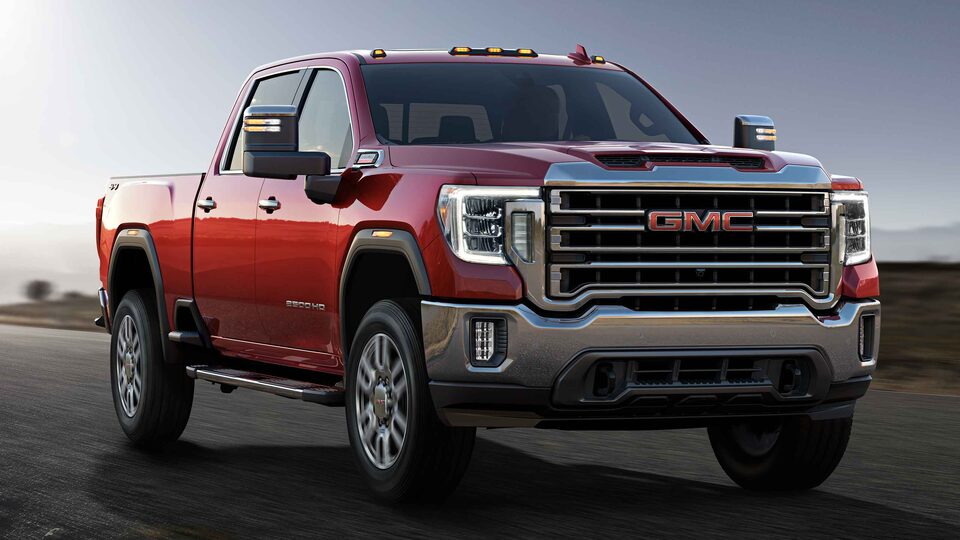 The Powerful Red GMC Sierra HD Parked On-Road