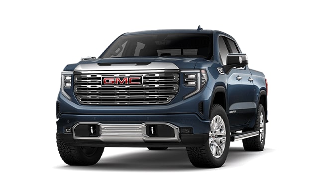 Pacific Blue Metallic GMC Sierra Denali Pickup Truck Parked