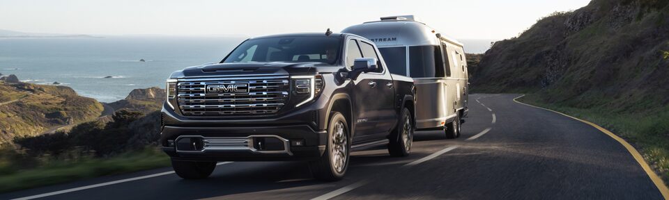 The GMC Sierra Towing an Air streamer on a Beautiful Coastal Road 