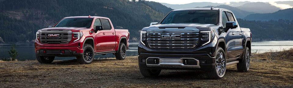 The Sierra AT4X & The Sierra Denali Displayed Fiercely with an Incredible Mountain & Lake Backdrop