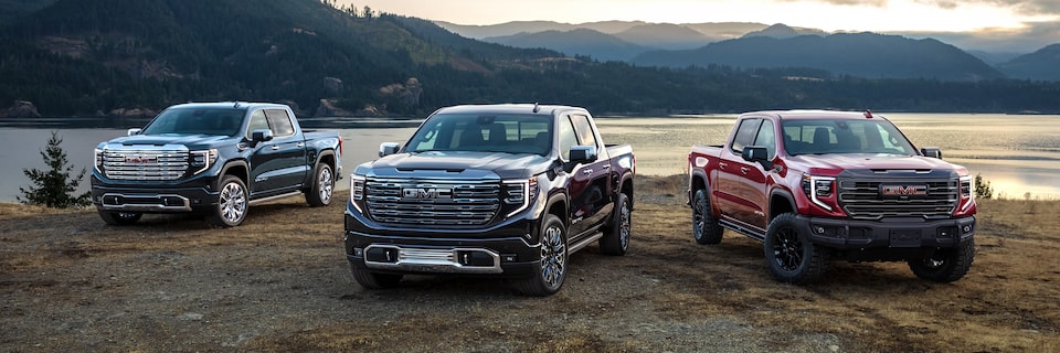 The Sierra AT4X & The Sierra Denali Displayed Fiercely with an Incredible Mountain & Lake Backdrop 