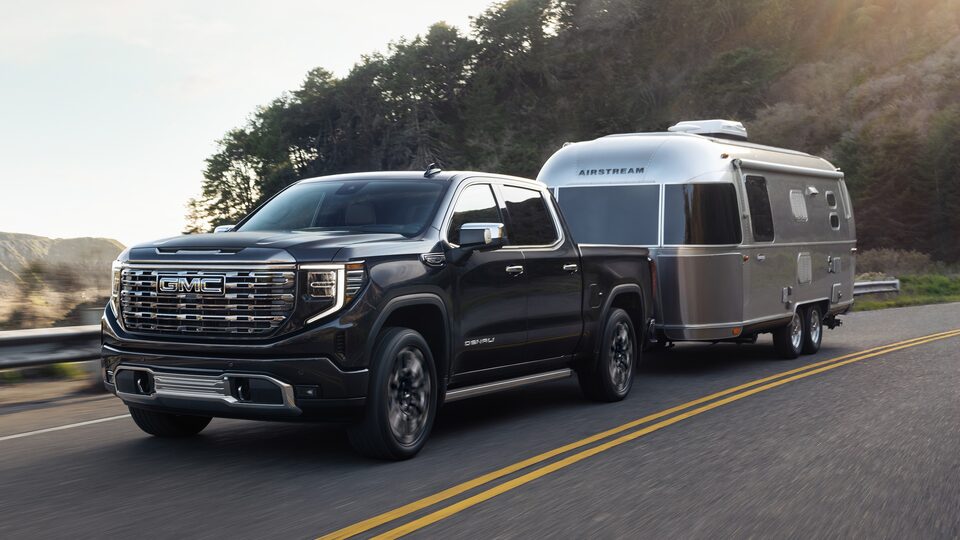 The Powerful GMC Sierra LD Towing a Trailer On-Road